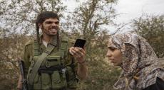 Photo of Israeli soldier mocking Palestinian woman sparks outrage online
